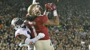Florida State Seminoles Benjamin catches the game winning touchdown pass while being covered by Auburn Tigers Davis in the fourth quarter during the BCS Championship football game in Pasadena